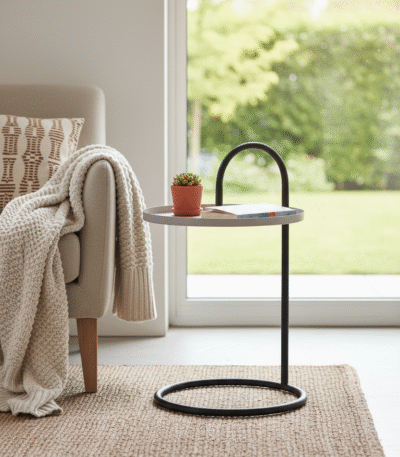 Elaro Hanging Top Side Table. Black Iron Side Table. Grey Round Top Table. Hanging Top Design. Modern Side Table. Minimalist Side Table. Industrial Accent Table. Contemporary Side Table. Round Metal Table. Sculptural Side Table. Sleek Black Frame Table. Durable Iron Table. Compact Accent Table. Living Room Side Table. Bedroom Nightstand Alternative. Modern Home Furniture. Statement Metal Side Table. Functional Accent Table. Industrial Modern Decor. Designer Side Table.