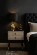 Fiora Shagreen Bedside Table. Shagreen leather bedside table. Two-drawer bedside table. Gold accent furniture. Modern nightstand. Luxury bedside table. Black leg table. Textured finish furniture. Contemporary bedroom décor. Boutique home style.