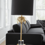 Hazel Table Lamp. Gold Leaf Lamp. Black Shade Lamp. Crystal Base Lamp. Geometric Table Lamp. Modern Accent Lamp. Luxury Table Lamp. Boutique Style Lamp. Contemporary Home Lighting. Sleek Table Lamp. Elegant Lamp. Decorative Lamp. Living Room Lamp. Bedroom Lamp. Office Lamp. Designer Lighting. Sculptural Table Lamp. Ambient Lighting. Metallic Lamp. Statement Lamp.