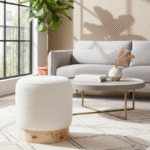 Luma Boucle Round Stool. Boucle stool. Round boucle stool. Cream boucle stool. Textured accent stool. Modern footstool. Luxury accent stool. Scandinavian style furniture. Burl wood stool. Natural wood base stool. Contemporary home furniture. Bedroom accent stool. Living room stool. Compact seating. Designer stool.