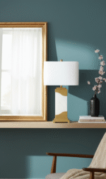 Meadow Table Lamp. Marble Pedestal Lamp. Gold Finish Table Lamp. Ivory Shade Lamp. Contemporary Table Lamp. Boutique Style Lamp. Minimalist Home Lighting. Modern Accent Lamp. Square Shade Lamp. Stylish Living Room Lamp. Desk and Side Table Lamp. Ambient Light Feature. Designer Home Lighting. Luxury Table Lamp. Elegant Interior Lighting.