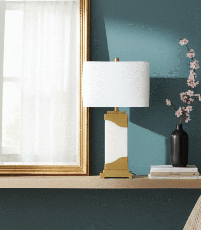 Meadow Table Lamp. Marble Pedestal Lamp. Gold Finish Table Lamp. Ivory Shade Lamp. Contemporary Table Lamp. Boutique Style Lamp. Minimalist Home Lighting. Modern Accent Lamp. Square Shade Lamp. Stylish Living Room Lamp. Desk and Side Table Lamp. Ambient Light Feature. Designer Home Lighting. Luxury Table Lamp. Elegant Interior Lighting.