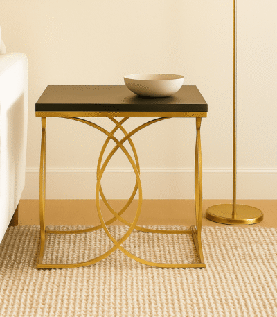Miro Side Table. Black marble furniture. Gold finish side table. Modern luxury décor. Minimalist accent table. Stainless steel frame. Elegant living room table. Marble and gold furniture. Compact modern table. Designer home accent.