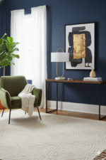 Neila Table Lamp. Brass Frame Table Lamp. White Fabric Shade Lamp. Marble Base Lamp. Contemporary Table Lamp. Modern Home Lighting. Chic Accent Lamp. Minimalist Table Lamp. Boutique Style Lighting. Ambient Light Feature. Portable Table Lamp. Desk Lamp. Side Table Lamp. Luxury Table Lamp. Elegant Home Accent.