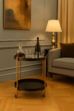 Corina 2 Tier Tray Table. Shagreen tray table. Two-tier drinks trolley. Gold finish frame. Black shagreen shelves. Modern bar cart. Luxury serving table. Contemporary accent furniture. Mobile side table. Boutique home décor.