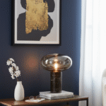 Vega Table Lamp. Black Marble Table Lamp. Gold Cognac Glass Lamp. Cylindrical Marble Lamp. Modern Table Lamp. Luxury Home Lighting. Boutique Style Lamp. Ambient Lighting Feature. Contemporary Table Lamp. Minimalist Desk Lamp. Elegant Side Table Lamp. Statement Home Lighting. Designer Table Lamp. Stylish Living Room Lamp. Durable Accent Lamp.