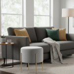 Vienna Round Velvet Stool. Round velvet stool. Velvet pouffe. Luxury accent stool. Modern footstool. Gold leg stool. Contemporary seating. Upholstered stool. Glam home furniture. Bedroom accent stool. Living room stool. Vanity stool. Compact seating. Round ottoman. Soft velvet furniture.