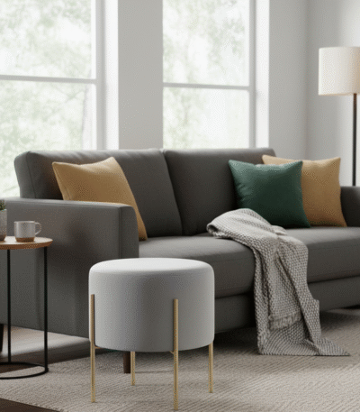 Vienna Round Velvet Stool. Round velvet stool. Velvet pouffe. Luxury accent stool. Modern footstool. Gold leg stool. Contemporary seating. Upholstered stool. Glam home furniture. Bedroom accent stool. Living room stool. Vanity stool. Compact seating. Round ottoman. Soft velvet furniture.