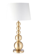 Rae Stacked Table Lamp. Brass table lamp. Orb base lamp. Modern lighting. Luxe home décor. Boutique-style lamp. White linen shade. Contemporary bedside light. Sculptural design lamp. Gold Table Lamp.