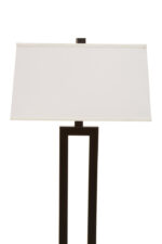 Kenton Monochromatic Floor Lamp. Black and white floor lamp. Modern standing lamp. Minimalist lighting. Contemporary home décor. Black metal frame lamp. White tapered shade. Elegant monochrome lamp. Ambient lighting solution. Modern living room floor lamp. Designer home accessory. Sleek contemporary floor lamp.