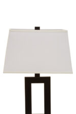 Kenton Monochromatic Table Lamp. Black and white table lamp. Modern desk lamp. Minimalist lighting. Contemporary bedside lamp. Black metal frame. White tapered shade. Monochrome design. Elegant modern lighting. Ambient home lighting. Bedroom lamp. Living room table lamp. Designer home accessory. Sleek decorative lamp.