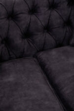 Naya 2 Seater Chesterfield Sofa. Dark grey velvet sofa. Velvet chesterfield sofa. 2 seater chesterfield. Classic velvet sofa. Button tufted sofa. Modern chesterfield couch. Traditional style sofa. Compact velvet sofa. Elegant grey sofa. Living room seating. Luxury velvet furniture. Grey chesterfield loveseat. Castor leg sofa. Plush velvet sofa.