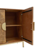 Zera 2 Door Sideboard. Carved mango wood sideboard. Natural wood storage unit. Gold leg sideboard. Modern dining room furniture. Contemporary mango wood cabinet. Handcrafted furniture. Luxury wooden sideboard. Sustainable home décor. Mango wood console. Elegant living room furniture. Gold metal frame sideboard. Artisan carved design. Minimalist storage cabinet. Eco-friendly wooden furniture. Boho chic sideboard. Durable modern furniture. Boutique style home decor. Rustic modern wood sideboard. Timeless furniture design.