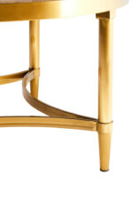 June Coffee Table. Coffee table with curved frame. Aged fir wood table. Gold metal base table. Round coffee table. Sculptural base table. Modern rustic coffee table. Transitional furniture. Luxury living room table. Contemporary coffee table. Curved design furniture. Gold accent table. Fir wood and metal coffee table. Elegant round table. Statement living room décor. Designer coffee table. Artful furniture design. Warm metallic finish table. Stylish home accent. Minimalist modern furniture.