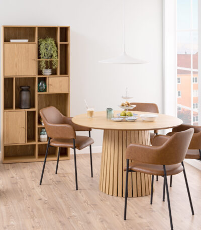 Lars Panelled Round Dining Table. Round oak dining table. Scandinavian dining table. Slatted base dining table. Pedestal dining table. Round wooden dining table. Oak kitchen table. Nordic dining furniture. Four seater dining table. Modern round dining table. Small dining table. Contemporary dining furniture.