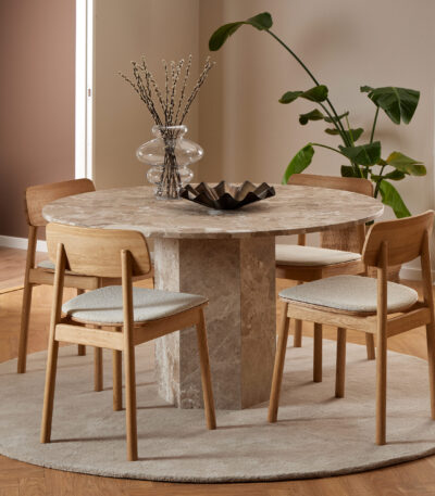 Round marble dining table. Travertine dining table. Brown marble table. Luxury dining furniture. Stone dining table. Modern dining table. Pillar base table. Contemporary dining room furniture. Statement dining table. Seating for five.