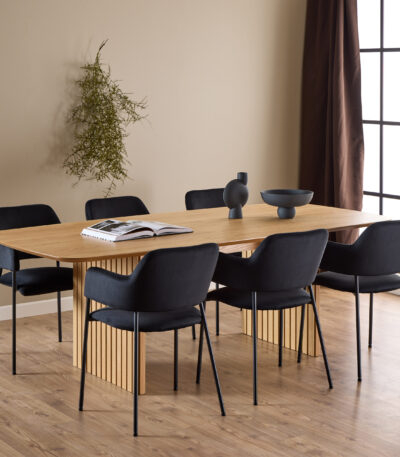 Arix Set of 2 Dining Chairs. Black velvet dining chairs. Modern dining chairs. Open back dining chair. Dining chairs with armrests. Matte black steel legs. Contemporary dining seating. Upholstered dining chairs. Compact dining chair. Luxury dining furniture.