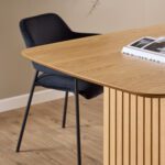 Arix Set of 2 Dining Chairs. Black velvet dining chairs. Modern dining chairs. Open back dining chair. Dining chairs with armrests. Matte black steel legs. Contemporary dining seating. Upholstered dining chairs. Compact dining chair. Luxury dining furniture.