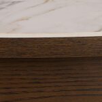 tending dining table. Ceramic top dining table. Modern dining table. Extendable table. Heat resistant dining surface. Scratch resistant tabletop. Contemporary dining furniture. Round extending table. Space saving dining table. Family dining table.