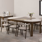 tending dining table. Ceramic top dining table. Modern dining table. Extendable table. Heat resistant dining surface. Scratch resistant tabletop. Contemporary dining furniture. Round extending table. Space saving dining table. Family dining table.