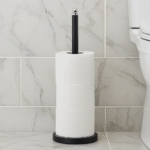 Alden Tall Toilet Roll Holder. Bathroom storage. Freestanding toilet roll holder. Black. Grey. White. Gold. Holder. Modern bathroom accessory. Sturdy iron design. Stainless steel top. Ergonomic height. Contemporary bathroom décor.