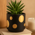 Arla Black & Gold Spotted Plant Pot. Black and gold ceramic plant pot. Handcrafted plant pot. Small and medium plant pot. Modern home décor. Luxe ceramic plant pot. Minimalist decorative plant pot. Artistic black ceramic pot. Contemporary gold accent plant pot.