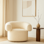 Axis Boucle Revolving Armchair. Swivel boucle chair. Cream boucle armchair. Black boucle armchair. Modern revolving chair. Curved back swivel seat. Contemporary boucle furniture. 360-degree swivel armchair. Luxury modern chair. Cosy boucle upholstery. Comfortable living room chair. Designer swivel seat. Textured boucle fabric chair. Elegant modern furniture. Black and cream boucle chair. Soft curved armchair. Functional office chair. Minimalist boucle design. Stylish lounge chair. Contemporary home seating.