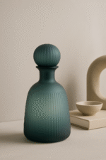 Blue Ombre Bottle Vase. Blue glass vase. Ribbed glass vase. Ombre design vase. Modern decorative vase. Slender bottle vase. Small medium large vase. Contemporary home décor. Artistic blue glass accessory.