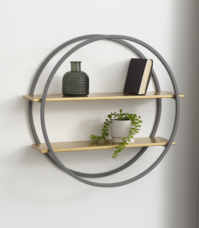 Carlotta Two Tier Wall Shelf. Gold wall shelf. Grey round wall shelf. Modern wall shelving. Geometric wall shelf. Metal wall shelf. Two tier shelf. Contemporary wall decor. Stylish storage shelf. Industrial modern shelf. Matte gold shelves. Circular wall shelf. Decorative shelving.