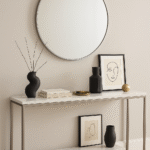 Crest Silver Wall Mirror. Round silver mirror. Minimalist wall mirror. Modern iron frame mirror. Elegant home décor. Contemporary wall accent. Sleek silver finish. Easy to hang mirror. Statement round mirror.
