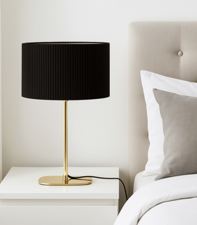 Forma Table Lamp. Gold table lamp. Silver table lamp. Ribbed shade lamp. Modern lighting. Contemporary décor. Metallic base lamp. Elegant bedside light. Luxury home accessory.