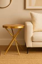 June Round Side Table. Modern side table. Gold finish table. Stainless steel frame. Sculptural base table. Aged fir wood top. Luxury accent table. Contemporary furniture. Small round table. Wooden top side table. Gold legs table. Modern living room décor. Glam side table. Natural wood furniture. Metal and wood table. Designer side table. Chic end table. Minimalist gold table. Round accent furniture. Elegant home décor.