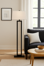 Kenton Monochromatic Floor Lamp. Black and white floor lamp. Modern standing lamp. Minimalist lighting. Contemporary home décor. Black metal frame lamp. White tapered shade. Elegant monochrome lamp. Ambient lighting solution. Modern living room floor lamp. Designer home accessory. Sleek contemporary floor lamp.