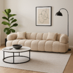 Koro 3 Seater Sofa. Quilted design sofa. Cream linen sofa. Modern curved sofa. Channel stitched sofa. Textured linen furniture. Contemporary living room sofa. Elegant modern couch. Comfortable linen seating. Minimalist three seater. Refined fabric sofa. Soft cream upholstery. Modern home seating. Luxury three seater. Cosy linen sofa. Sculptural modern sofa. Stylish curved couch. Timeless linen sofa. Boutique home furniture. Contemporary lounge seating.