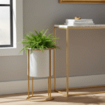 Lane White & Gold Floor Standing Plant Pot. Modern indoor planter. White and gold plant stand. Luxury home décor. Small and large floor planter. Minimalist plant holder. Contemporary gold frame planter.