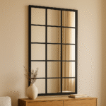 Meza Grid Rectangular Wall Mirror. Grid wall mirror. Rectangular decorative mirror. Modern wall mirror. Statement home mirror. Industrial style mirror. Contemporary wall décor. Decorative mirrors UK. Living room wall mirror. Bedroom wall mirror. Hallway mirror. Large wall mirror. Metal grid mirror. Rectangular home mirror. Modern interior mirror.