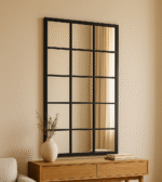 Meza Grid Rectangular Wall Mirror. Grid wall mirror. Rectangular decorative mirror. Modern wall mirror. Statement home mirror. Industrial style mirror. Contemporary wall décor. Decorative mirrors UK. Living room wall mirror. Bedroom wall mirror. Hallway mirror. Large wall mirror. Metal grid mirror. Rectangular home mirror. Modern interior mirror.