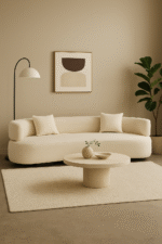 Noor 3 Seater Sofa. Curved silhouette sofa. Cream linen sofa. Modern three seater couch. Contemporary curved sofa. Neutral fabric seating. Elegant linen furniture. Sculptural modern sofa. Luxury living room furniture. Soft cream sofa. Minimalist home decor. Linen upholstered sofa. Comfortable modern seating. Refined three seater. Plush linen couch. Designer curved sofa. Stylish cream couch. Modern lounge furniture. Timeless linen sofa. Statement living room piece.