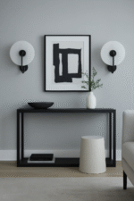 Nyra Marble Wall Light. White marble wall light. Modern wall sconce. Luxury marble lighting. Matte black wall light. Gold finish wall light. Elegant lighting fixture. Contemporary wall lamp. Designer wall light. Minimalist marble decor. High-end lighting design. Warm ambient wall light. Bedroom wall lighting. Hallway wall lamp. Modern interior lighting.