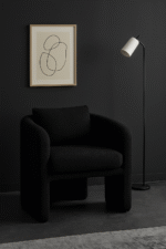 Oreno Boucle Armchair. Cream boucle chair. Black boucle chair. Modern curved armchair. Textured accent chair. Contemporary boucle seating. Upholstered lounge chair. Minimalist armchair. Sculptural modern chair. Comfortable designer chair. Boucle fabric furniture. Luxury modern furniture. Cosy cream chair. Soft textured armchair. Modern living room furniture. Plush cushioned chair. Stylish black armchair. Curved silhouette chair. Elegant home seating. Boutique interior furniture.