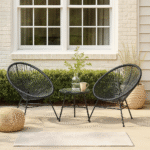 Raven Rattan 3 Piece Patio Set. Modern patio furniture. Rattan outdoor set. Black rattan chairs. Weather-resistant patio set. Contemporary garden furniture. Steel frame outdoor set. Balcony furniture. Outdoor seating set.