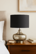 Reign Silver Table Lamp. Silver glass lamp. Black linen shade lamp. Modern table lamp. Metallic home décor. Contemporary lighting. Elegant bedside lamp. Luxe accent lighting.