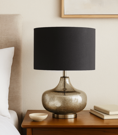 Reign Silver Table Lamp. Silver glass lamp. Black linen shade lamp. Modern table lamp. Metallic home décor. Contemporary lighting. Elegant bedside lamp. Luxe accent lighting.