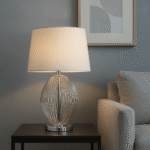 Rendell Wireframe Table Lamp. Chrome finish lamp. Modern wireframe lighting. Linen shade lamp. Contemporary table lamp. Elegant home lighting. Metal wire body lamp. Bedroom bedside lamp. Living room lighting. Office desk lamp. Minimalist home décor. Polished chrome lamp. Modern interior lighting. Ambient table lamp.