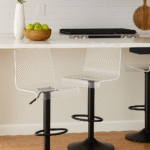 Renn Acrylic Bar Stool. Modern bar stool. Clear acrylic stool. Transparent kitchen seating. Black metal bar stool. Contemporary home bar furniture. Minimalist bar seating. Durable acrylic furniture.