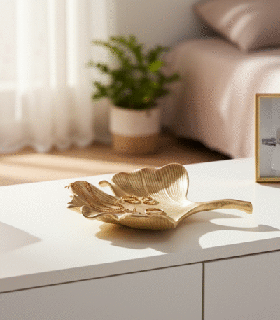 Ressa Leaf Trinket Dish. Gold aluminium décor. Gingko leaf dish. Luxe jewellery holder. Handcrafted home accessory. Nature-inspired décor. Elegant trinket bowl.