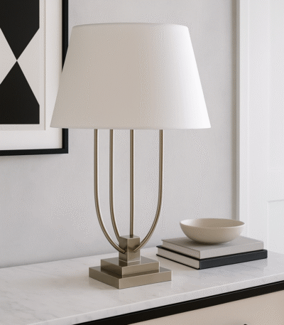 Silo Curved Table Lamp. Satin nickel lamp. Modern table lamp. Boutique lighting. White shade lamp. Silver base lamp. Contemporary home décor. Sculptural table lamp. Pagoda-inspired design.