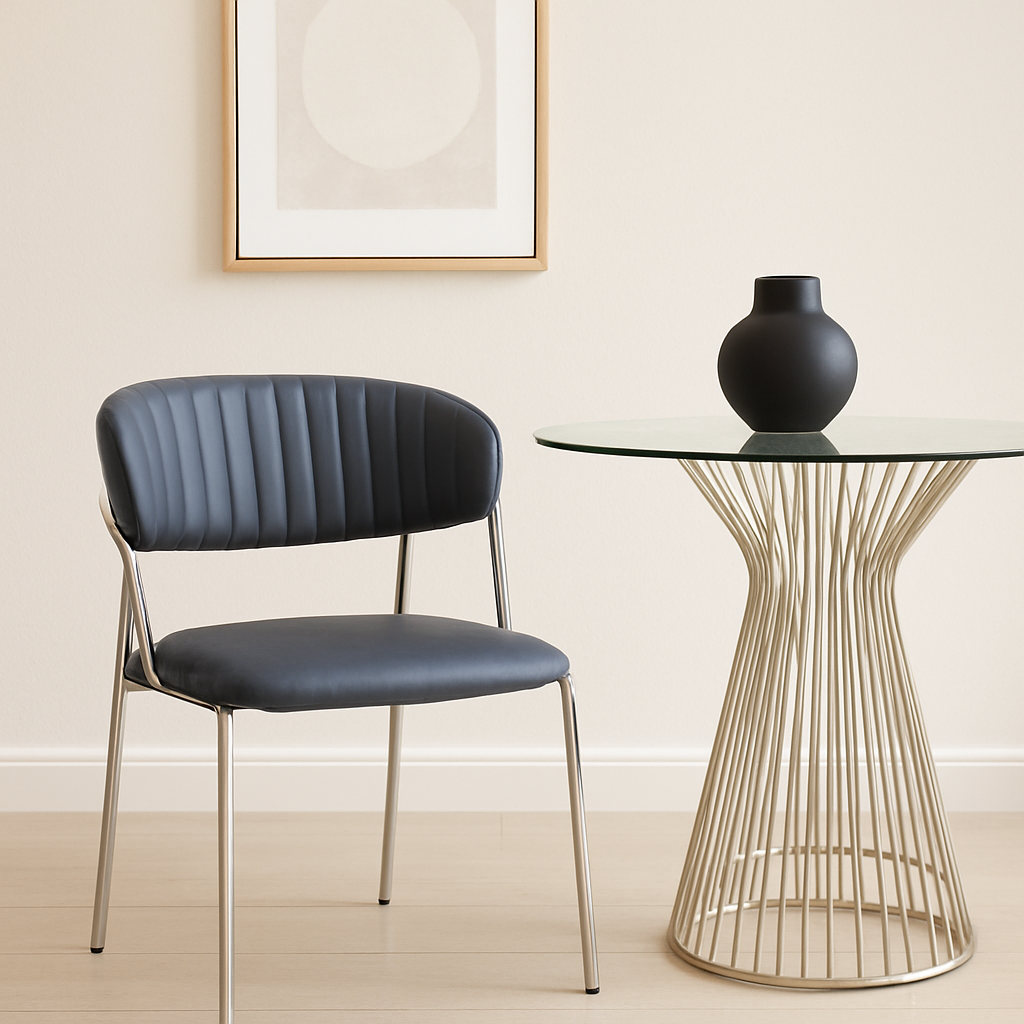 Taryn Leather Dining Chair Taryn Leather Dining Chair. Grey leather dining chair. Modern dining chair. Chrome leg dining chair. Contemporary leather chair. Padded dining chair. Tufted backrest chair. Minimalist dining furniture. Ergonomic dining chair. Stylish grey chair. Luxury dining seating. Metal frame dining chair. Modern kitchen chair. Easy clean leather chair. Industrial dining chair. Sleek dining chair. Compact dining chair. Modern home furniture. Comfortable dining chair. Dark grey upholstered chair.