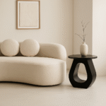 Tova Cutout Side Table. Mango wood side table. Black side table. White side table. Modern side table. Sculptural furniture. Contemporary accent table. Minimalist side table. Handcrafted furniture. Round top table. Horseshoe base table. Living room table. Bedroom side table. Wooden side table. Artisanal furniture. Stylish end table. Modern home decor. Designer side table.