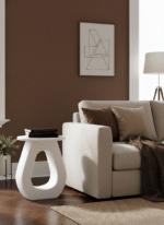 Tova Cutout Side Table. Mango wood side table. Black side table. White side table. Modern side table. Sculptural furniture. Contemporary accent table. Minimalist side table. Handcrafted furniture. Round top table. Horseshoe base table. Living room table. Bedroom side table. Wooden side table. Artisanal furniture. Stylish end table. Modern home decor. Designer side table.